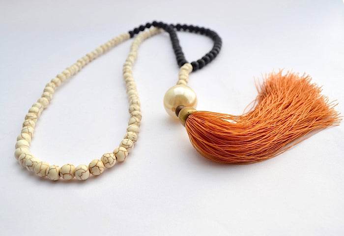 DUAL CREMA STONE & ONYX BEADS LARGE FAUX PEARLY BALL W LONG BURNT ORANGE TASSEL NECKLACE